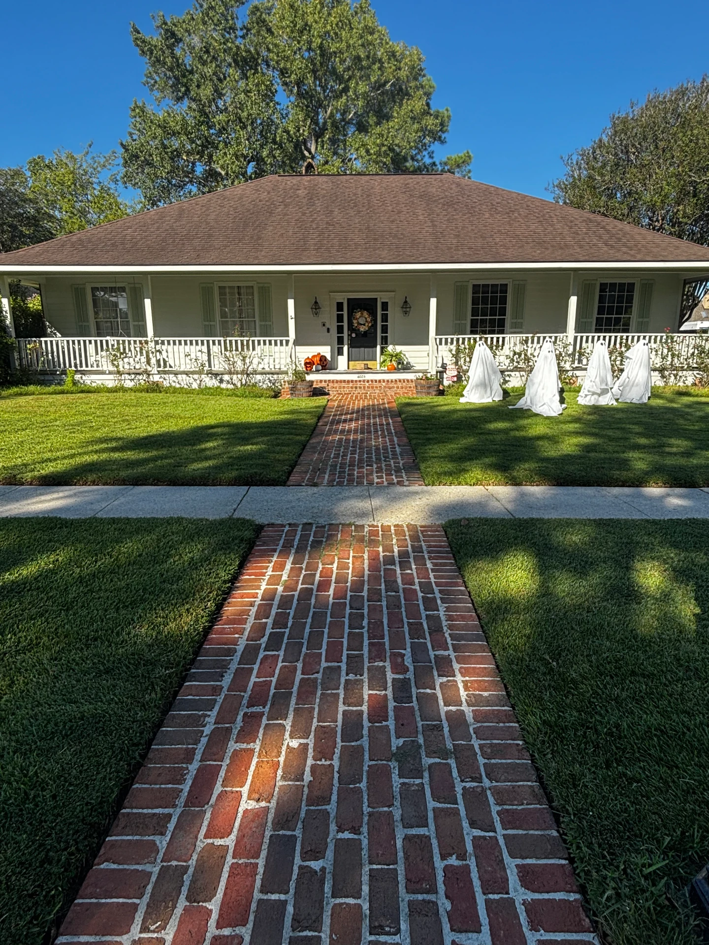 Front of house with brick walkway after cleaning